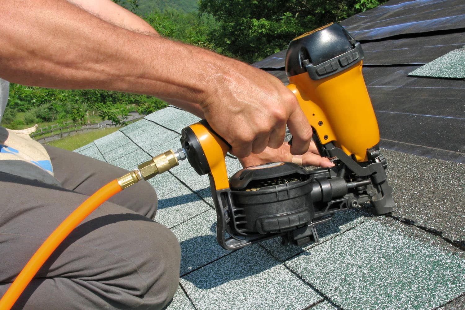 Vertex Roofing crew completing a roof replacement in Utah